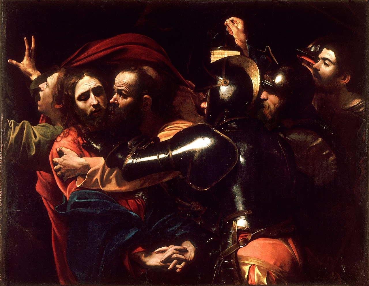 Caravaggio's dramatic dark painting of the arrest of Christ, an armored soldier seizing Jesus as Judas kisses him.